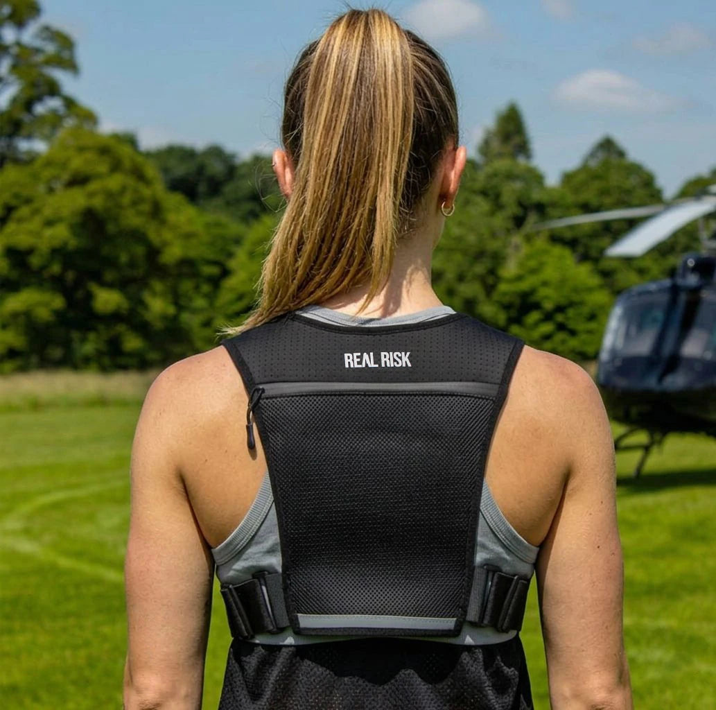 RealRisk UltraX running vest back view showing mesh panel, rear zip pocket and waist adjustment straps